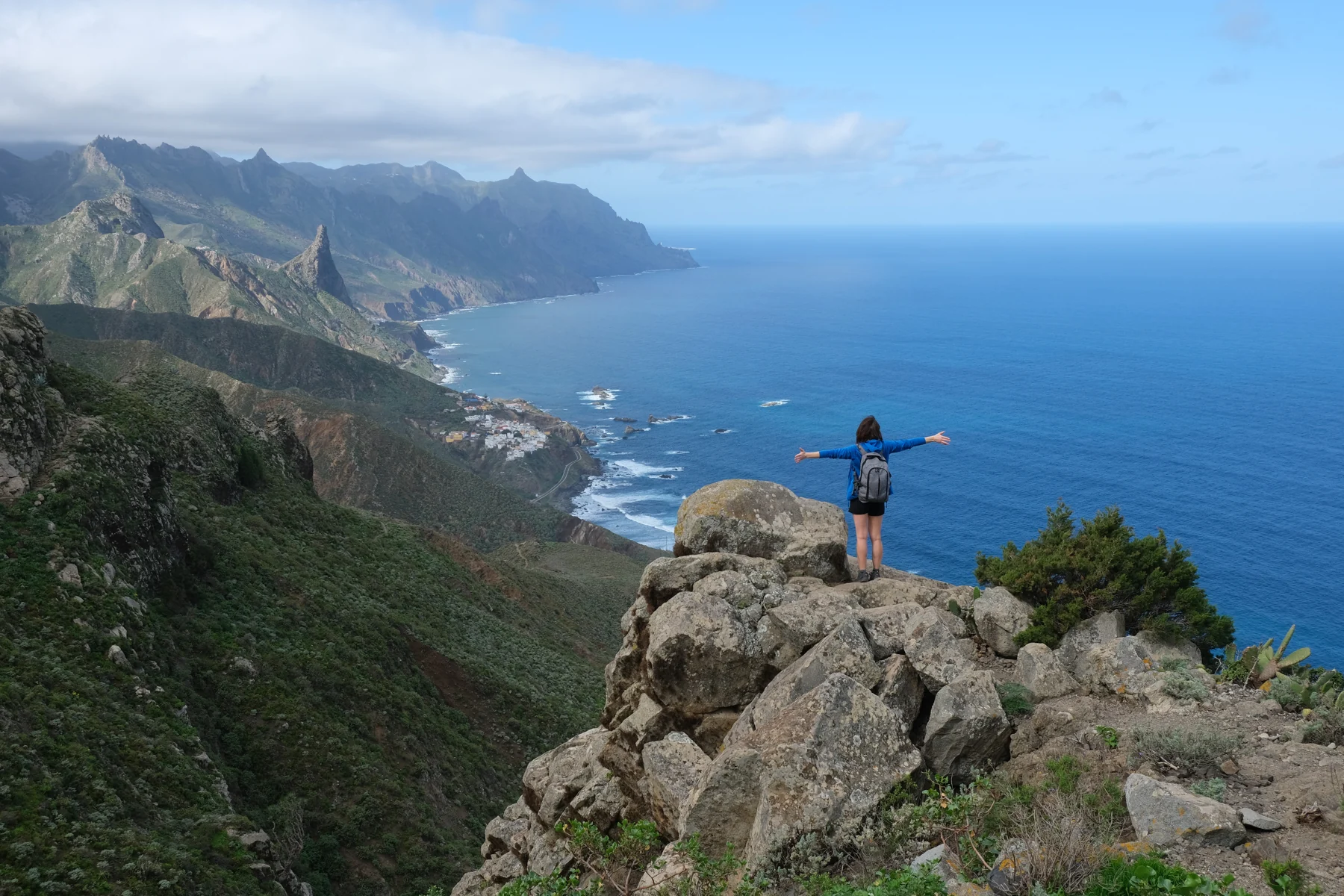 A hiker looking out over Tenerife’s Anaga mountains and the Atlantic